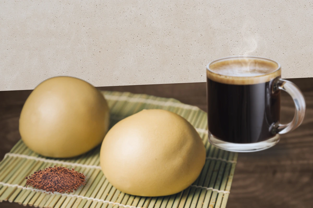 孔子饅頭【子羽-純黑糖饅頭】外型特寫，饅頭呈現溫潤的黑糖色，選用新竹寶山黑糖，口感紮實有嚼勁。